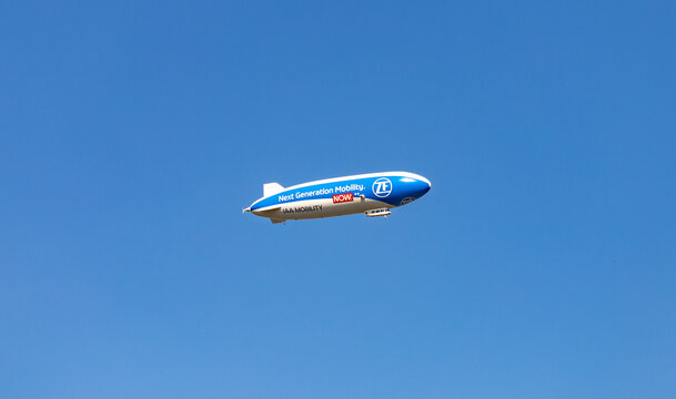 Katowice, Poland - September 11, 2021: A picture of an advertising zeppelin from ZF flying in Katowice.