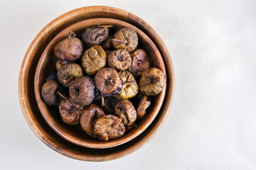 Homemade dried figs.
Dry sweet figs fruit bunch snack. Eastern healthy sweetness.