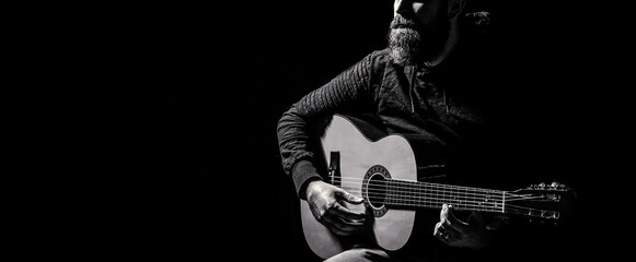 Acoustic guitars playing. Music concept. Guitars acoustic. Live music. Man's hands playing acoustic guitar, close up. Music festival. Male musician playing guitar, music instrument - Powered by Adobe