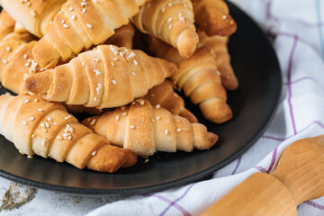 Traditional rolled dough called Kiflice served on white background