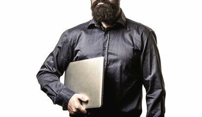 Holding laptop computer. Serious handsome bearded man worker laptop. Bearded male businessman holding a computer in his hands isolated on white background. Businessman using his laptop, pc.