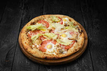 Italian pizza on a dark table
