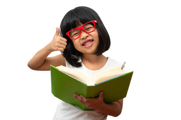 Happy Asian little preschool girl wearing red glasses holding a green book and thumbs up on white isolated background. Concept of school kid and education in elementary and preschool, home school