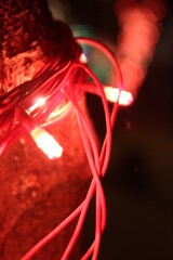 Red LED tied around a tree