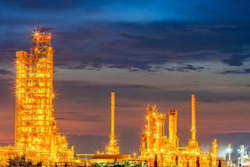 sunset view of refinery petroleum and petrochemical plant industrial with distillation column and engineering equipment and pipe in manufactory for chemistry gas and power energy technology production