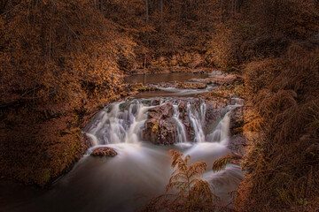 Fototapeta na wymiar Waterfall autumn colors