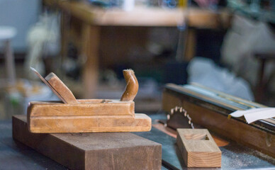 Old carpentry plane. Joiner's tool. A carpenter. Furniture manufacturing