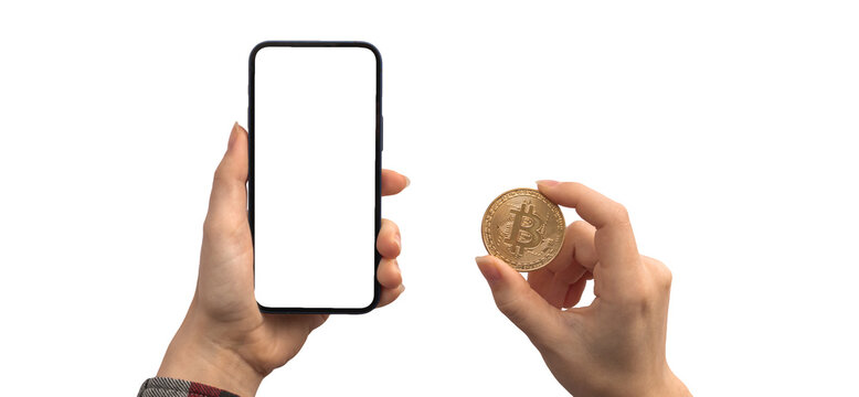 Financial payment with bitcoin and mobile phone, blank white screen mockup, hands with cryptocurrency coin isolated on a white background photo