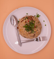 Asian food. Fide Jasmin rice white sausage served on white plate