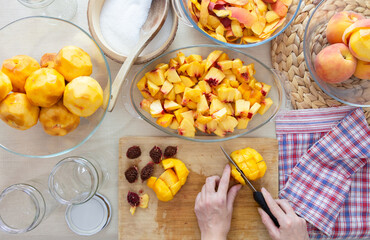 making peach jam on the table, making peach compote