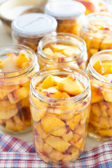 making peach jam on the table, making peach compote