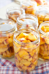making peach jam on the table, making peach compote