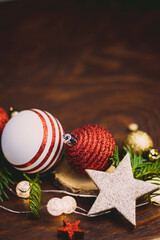 Christmas Bauble Arrangement With Lights On Dark Brown Wood