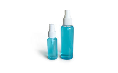 Two Plastic Spray Bottles of Blue Alcohol Disinfectant - Hand Sanitizer Sprayer - Isolated Object on Clean White Background - Mini Pocket Size of Mist Spray Bottles