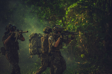  soldier with a rifle.Army soldier in protective uniform holding rifle .special forces soldier...