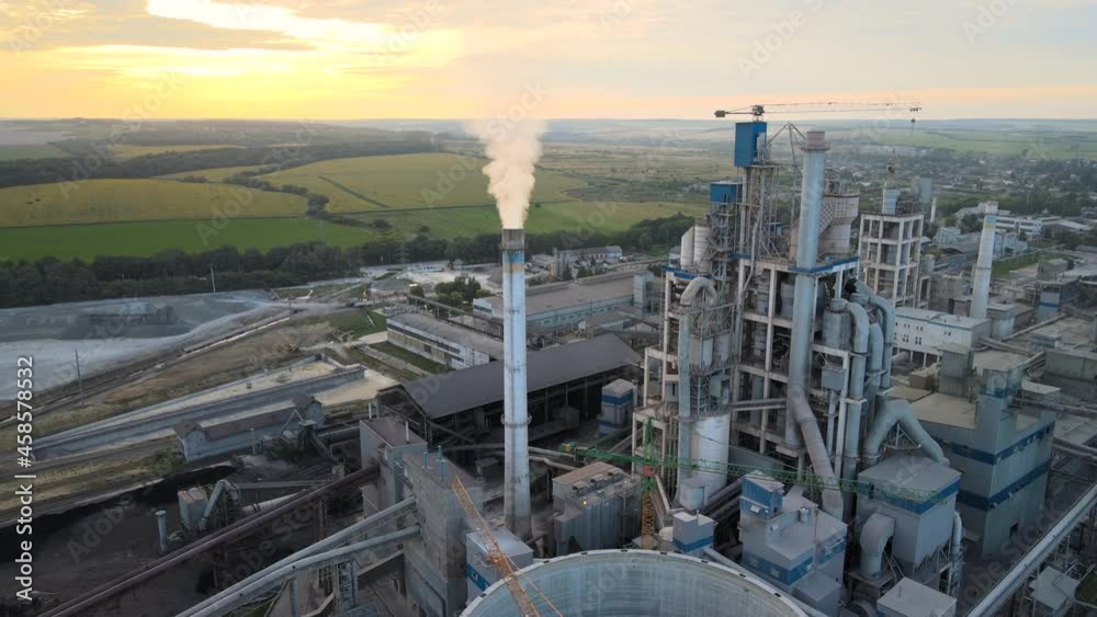 Wall mural aerial view of cement factory tower with high concrete plant structure at industrial production area