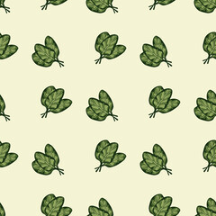 Seamless pattern bunch spinach salad on beige background. Simple ornament with lettuce.