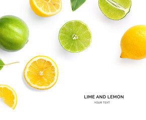 Creative layout made of lemon, lime and leaves. Flat lay. Food concept. Lemon and lime on white background. - obrazy, fototapety, plakaty