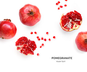 Creative layout made of pomegranate on the white background. Flat lay. Food concept. Macro concept.