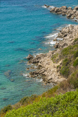 view from cliff top down to a rugged coastline