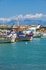 Fototapeta na wymiar A small fishing harbour with boats