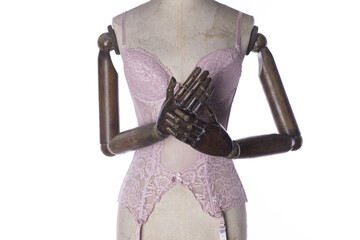 vintage lingerie on mannequin isolated on white background