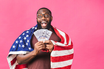 Winner! Young rich happy african american black man in casual holding money dollar bills with...