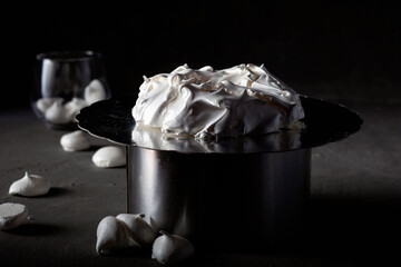 Homemade meringue base for Pavlova cake on black concrete texture background. Copy space.
 - obrazy, fototapety, plakaty