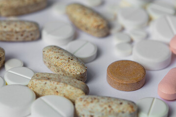 heap of different pills background