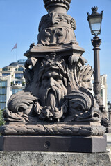 Obraz premium Sculptures en bronze du pont Neuf à Paris, France