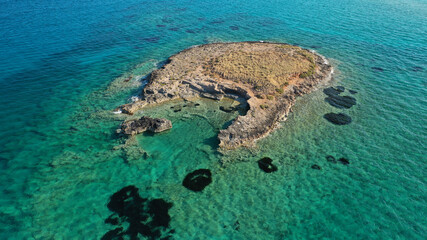 Aerial drone photo of prehistoric settlement of Pavlopetri a sunken city and archaeological site just below surface near popular Pounta beach and Elafonisos island, Peloponnese, Greece