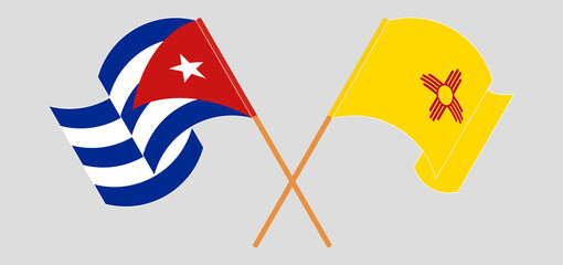 Crossed and waving flags of Cuba and the State of New Mexico