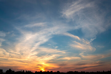 Dramatic sky on summer sunset. Beautiful clouds.