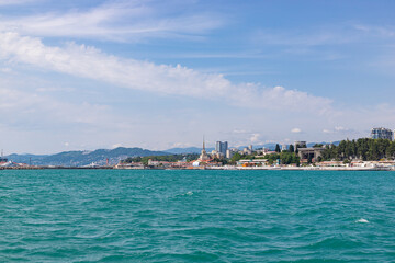 Naklejka premium Sochi city coast panorama at summer. View from yacht. Black sea, Russia.