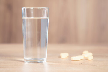 drugs with glass of water