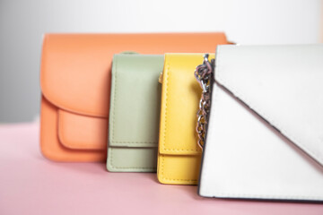 colorful fashion handbags on table