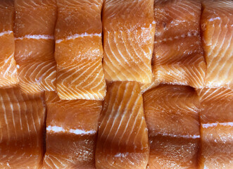 salmon fish background poke day top view slice piece
