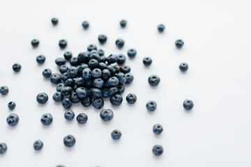 A bunch of ripe, beautiful blueberries, blueberries close-up on a white background. Healthy food, and vitamins.