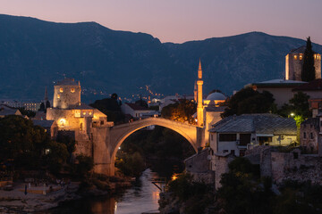 Mostar, Bosnia and Herzegovina - September 12 2021: Mostar Bridge - Stari Most view in the evening in summer, famous touristic destination in Bosnia and Herzegovina, Europe