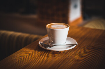 Close up white coffee cup. White Espresso cup in cafe.