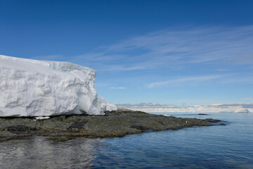 Antarctic landscape with iceberg