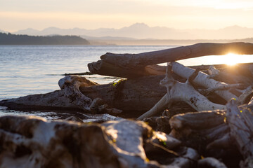 sunset on the lake with mountains 