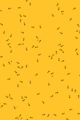 A lot of small snowmen on a yellow background