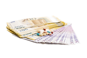 Euro banknotes and pills