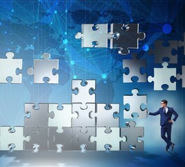 Business concept of teamwork with puzzle pieces