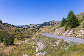 Mountain pass road Col de Varsd as part of the Route des Grandes Alpes in the french alps