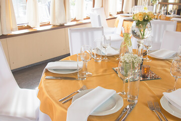 Empty dishes are installed in the restaurant. Part of the interior