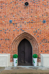 Warta, gotycki portal kościoła parafialnego św. Mikołaja - obrazy, fototapety, plakaty