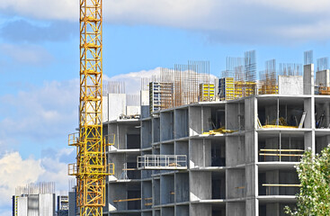 Crane and highrise construction site