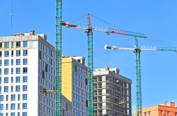 Crane and highrise construction site